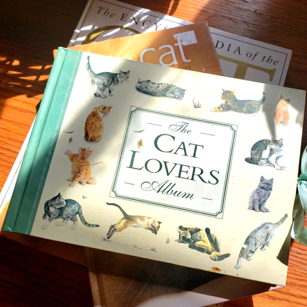 Cat books and photo album